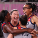 Jacquelyn Young, Stefanie Dolson, Kelsey Plum, and Allisha Gray celebrate winning the gold medal.
